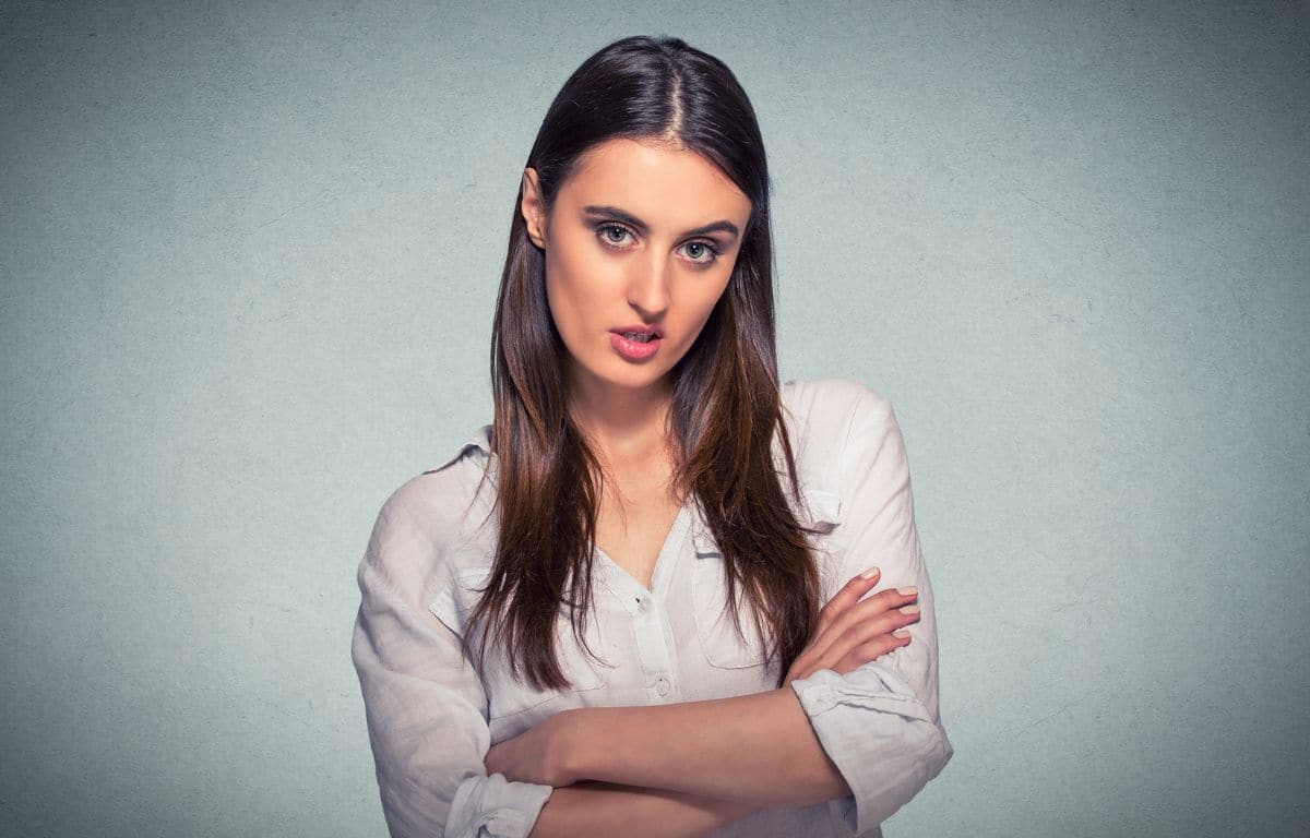 Confident Jersey woman with attitude arms crossed